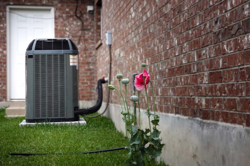 AC unit outdoors near a home.