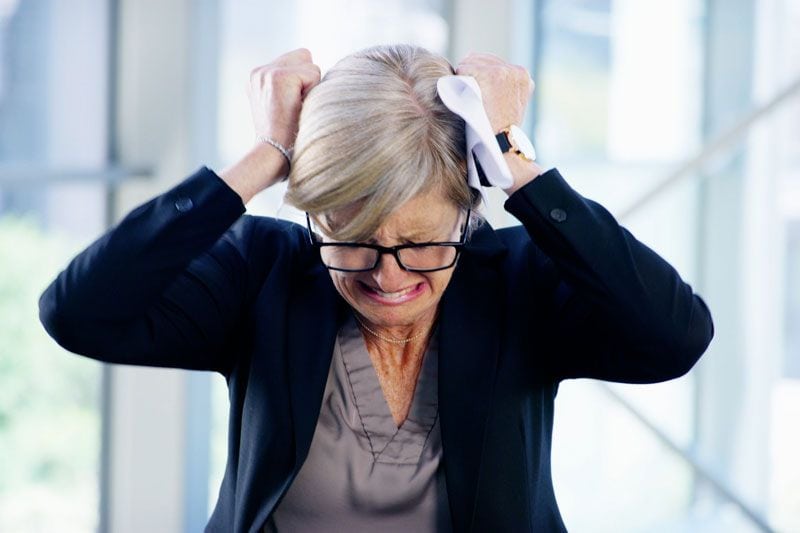 Image of someone pulling their hair. Video - Have Your utility Bills Jumped?